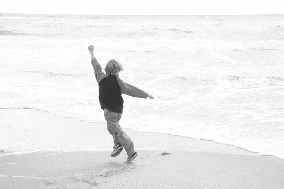 Joy at the beach in monochrome