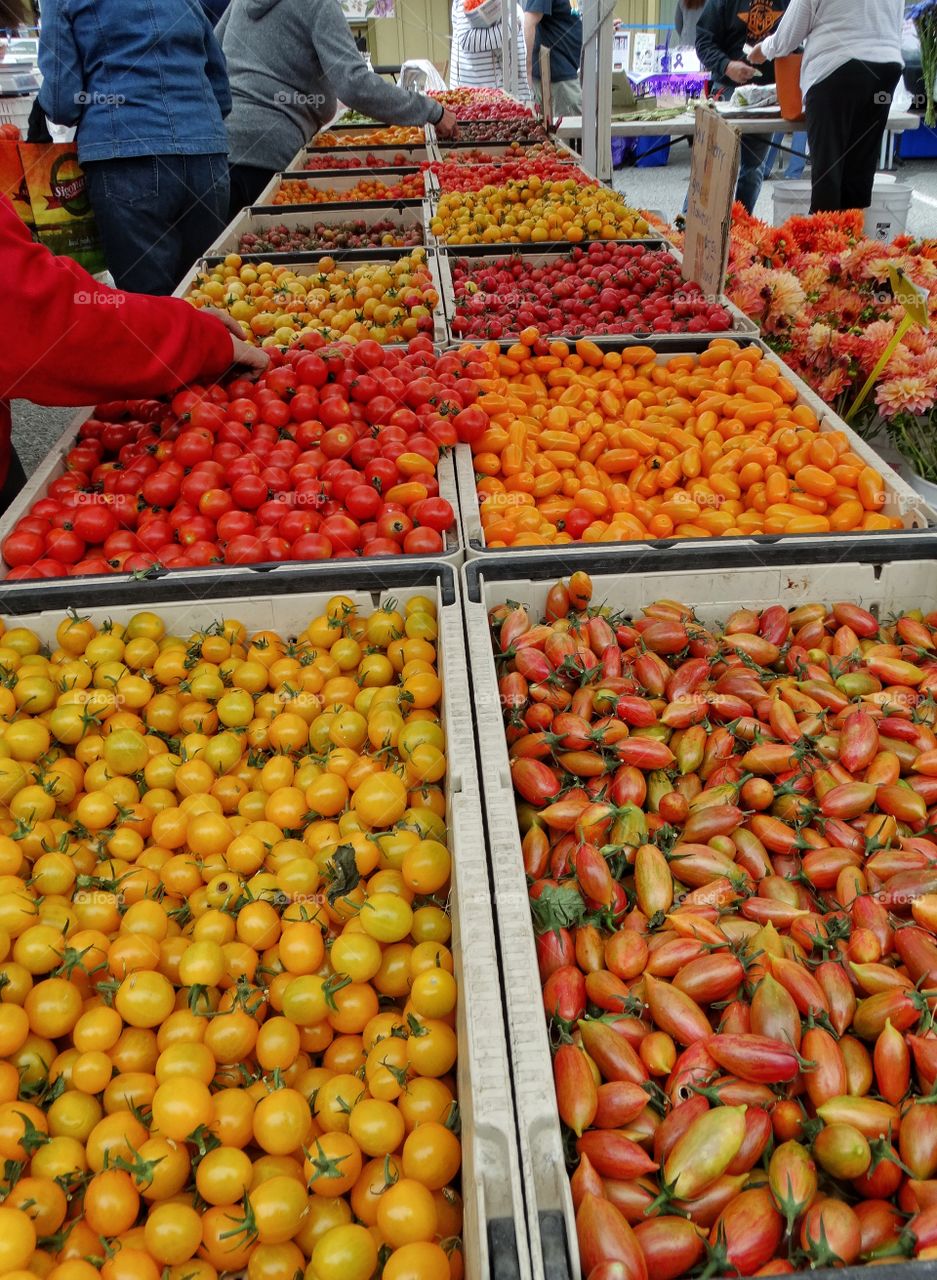 Variety Of Tomatoes At An Outdoor Market
