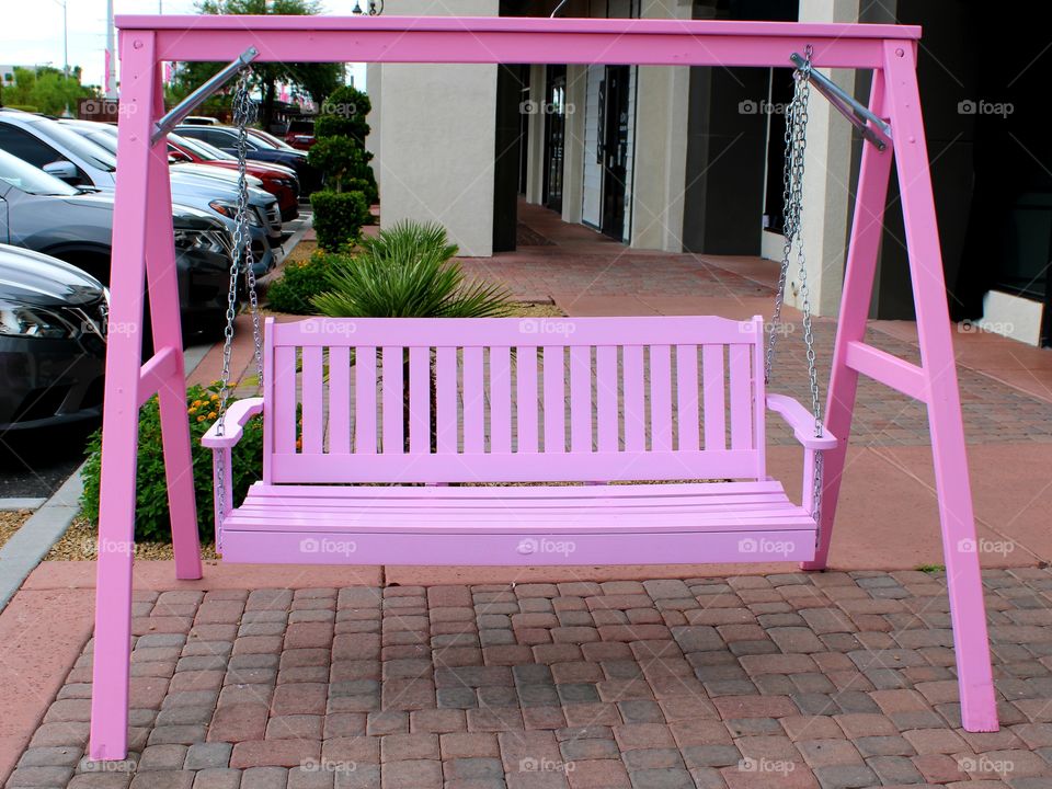 pink yard swing