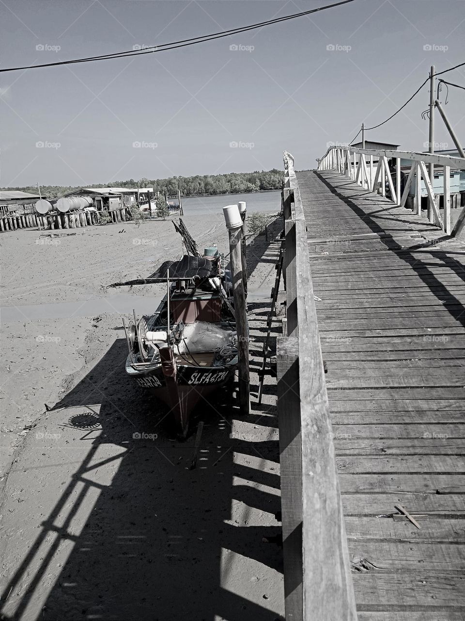 A boat and the bridge.