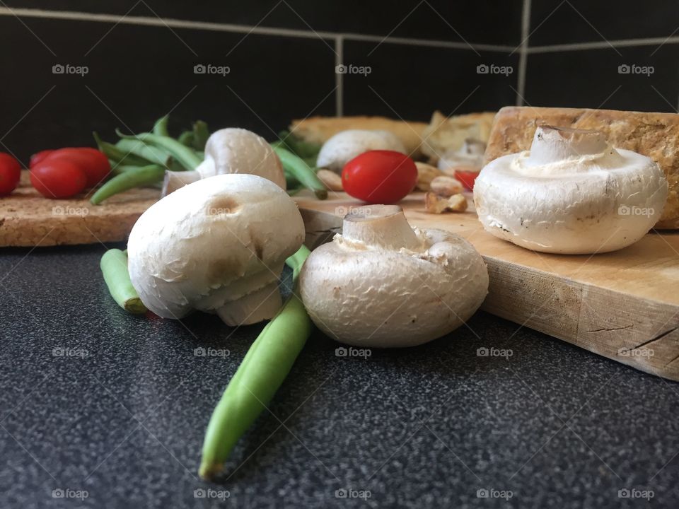 Fresh champignons on the table