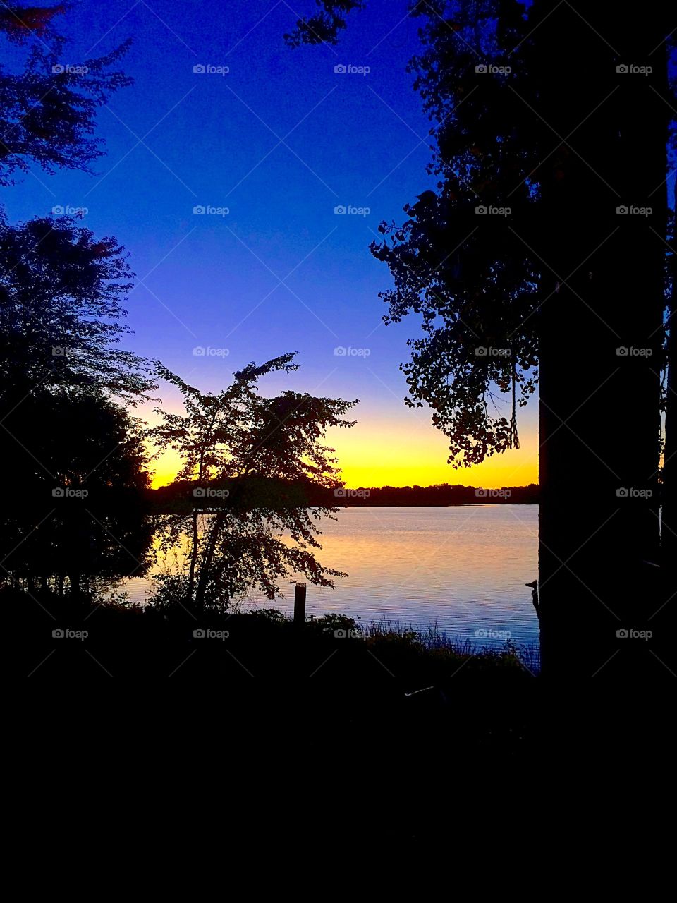 Scenic view of a lake during sunset