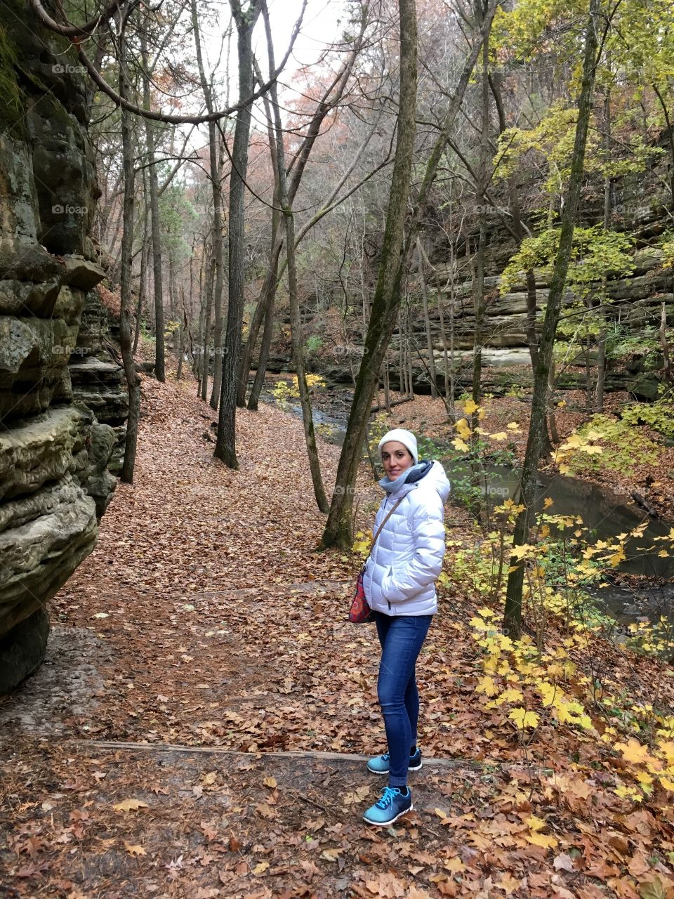 woman posing for a photo in the forest