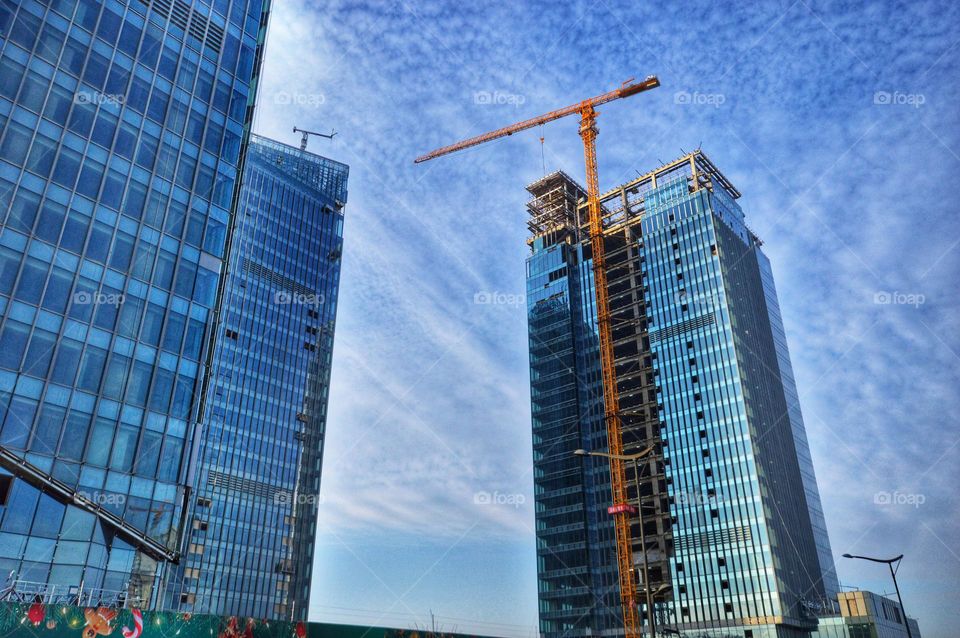 beautiful mirrored skyscrapers against the blue sky