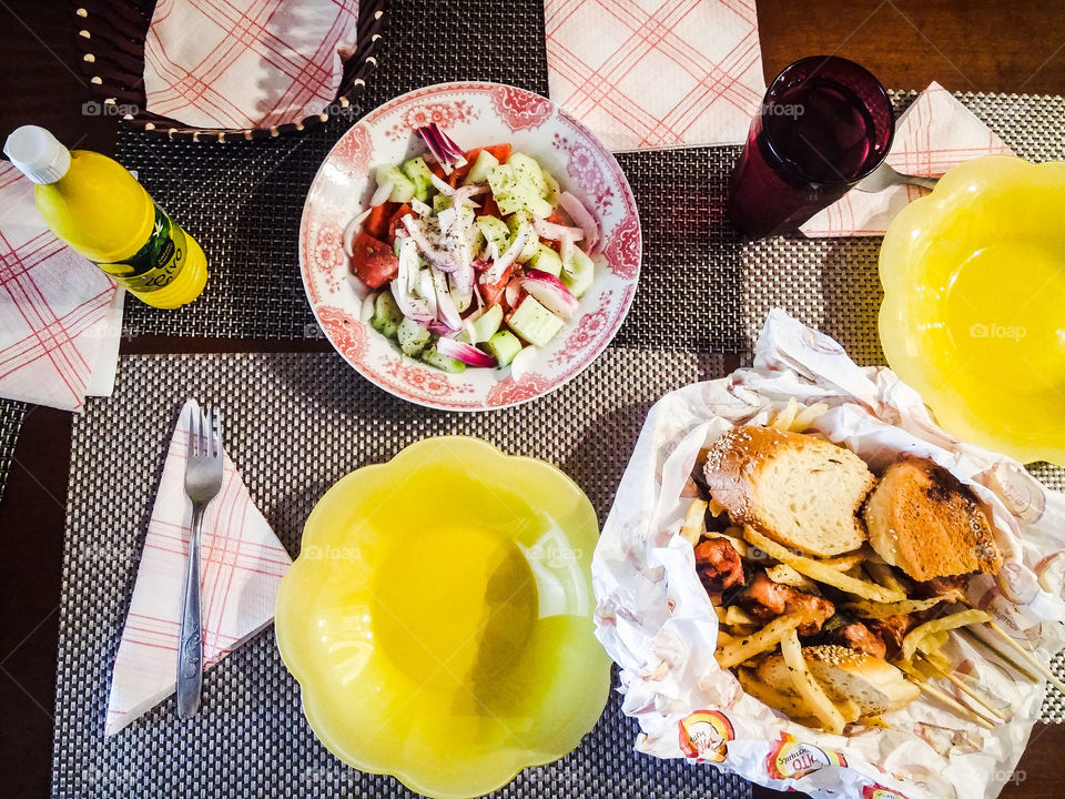greek salad,  fries and souvlakis