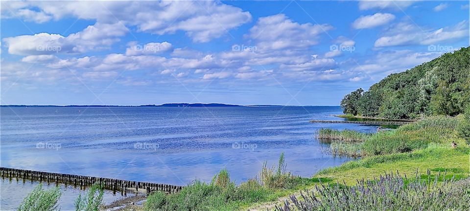 This is the “Strelasund”, a part of the “Baltic Sea” separating the island of “Rügen” from the city of “Stralsund” in “Mecklenburg - Western Pomerania”, Germany. The nearby “Rügenbrücke” leads across. 2024. Hypnotic Productions