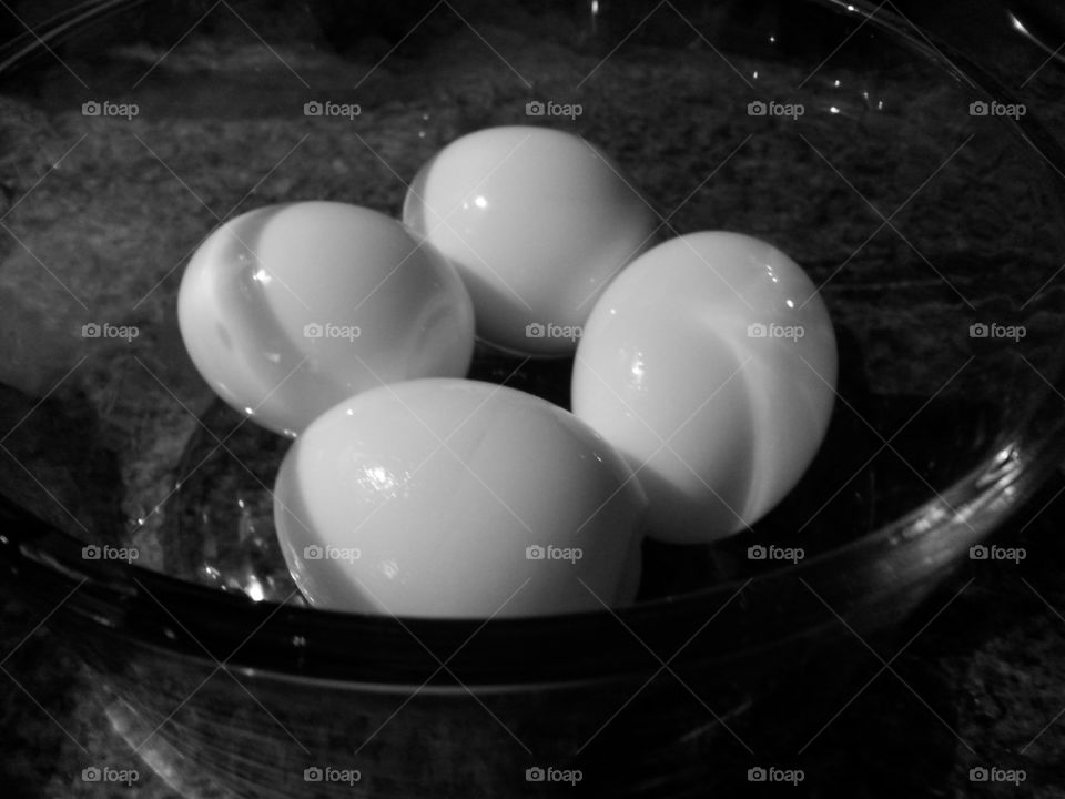 hard boiled eggs. hard boiled eggs in glass bowl