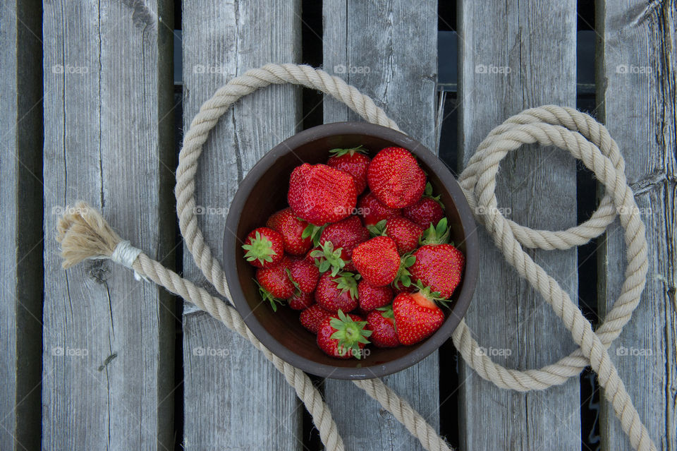 Strawberries on a wooden background 
