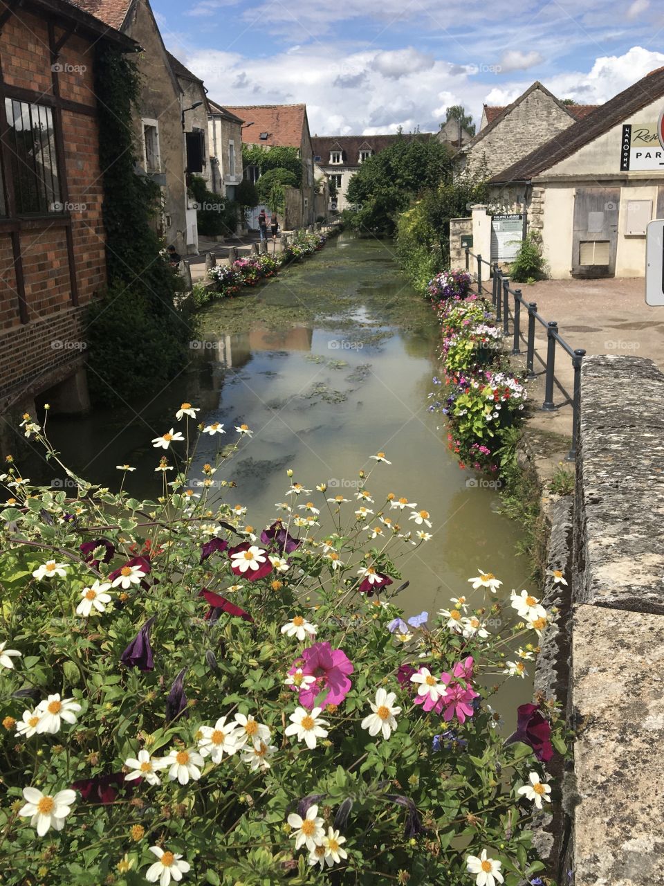 Little river across a French village