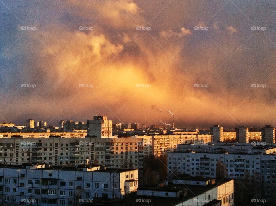 Tsunami sunset. Dramatic sunset sky above the concrete high-rises of Kharkiv, Ukraine