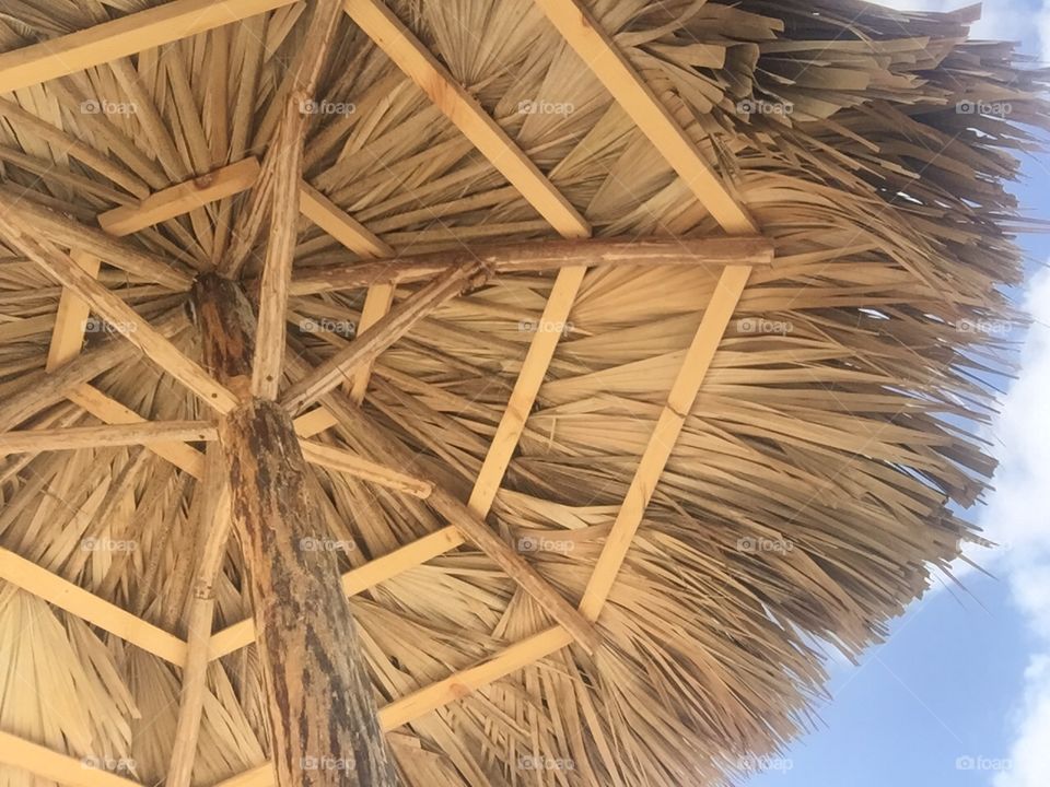 Umbrella made of leaves on a beach in Varadero, Cuba.