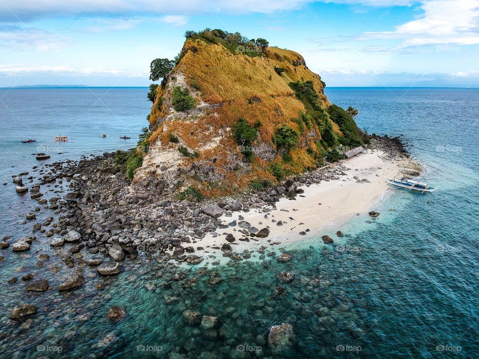 This island is called Sumbrero island in batangas as it resembles a hat.