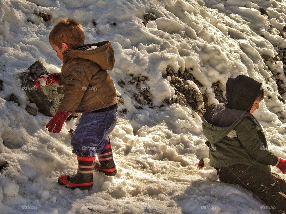 Children Playing In Snow