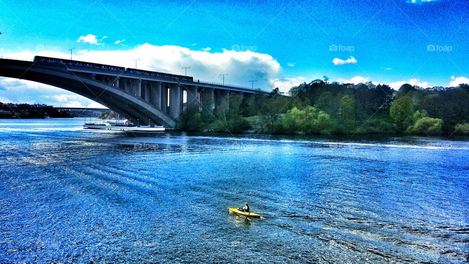 kayaking towards the bridge