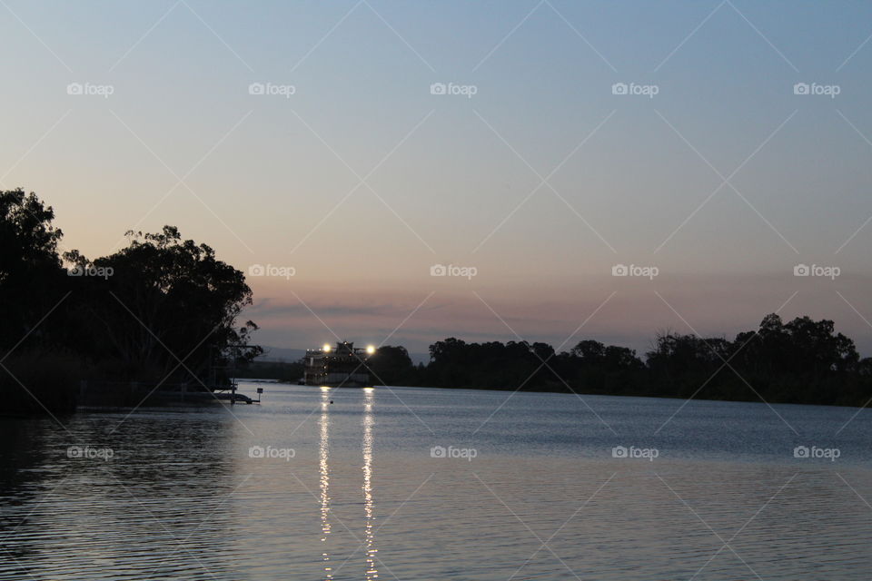 Murray Princess making its way along the mighty Murray in the setting sun