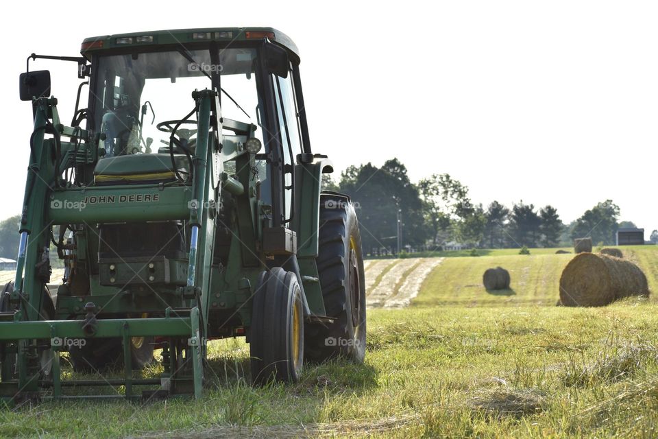 A tractor stands in a field