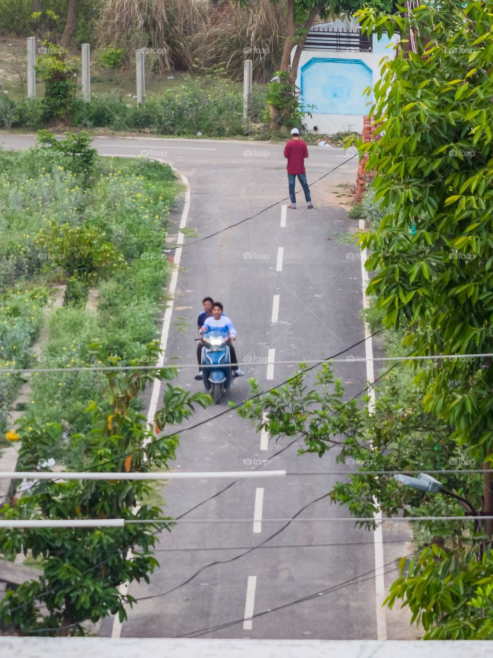 people commuting on motorcycle