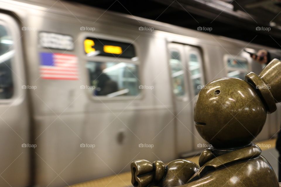 Statue of Man in NYC Subway