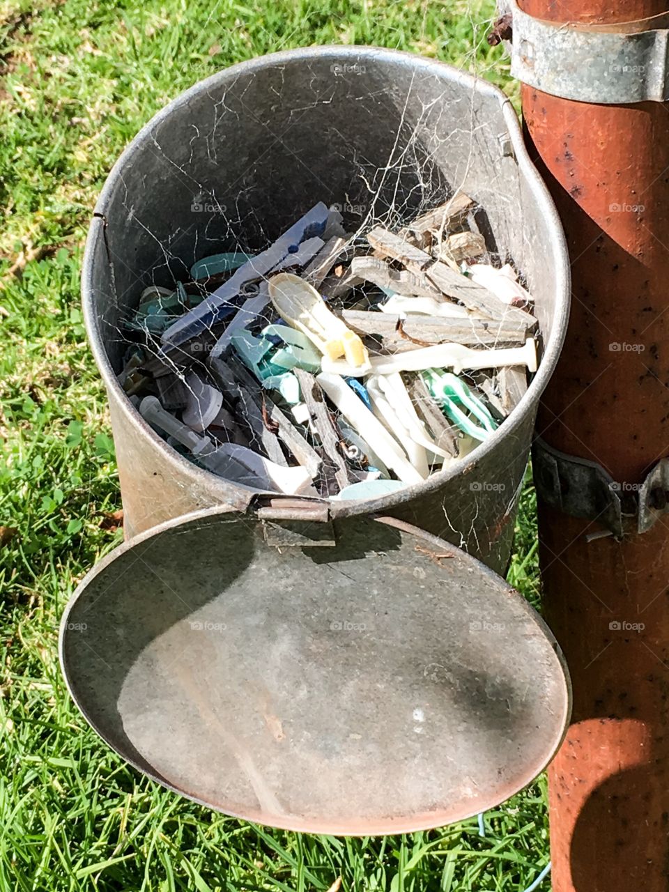 Old tin clothespin clothes peg Pail, tin, container cobwebs