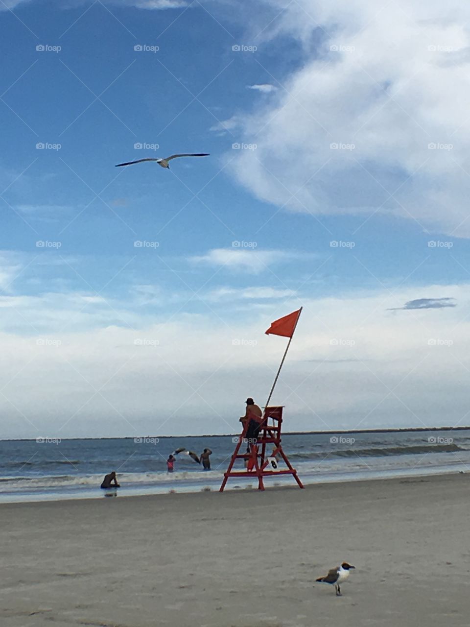 Lifeguards, red flag, beach