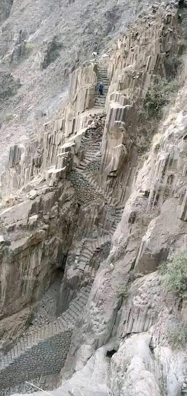 A stunning view of green mountains covered in fog in Yemen