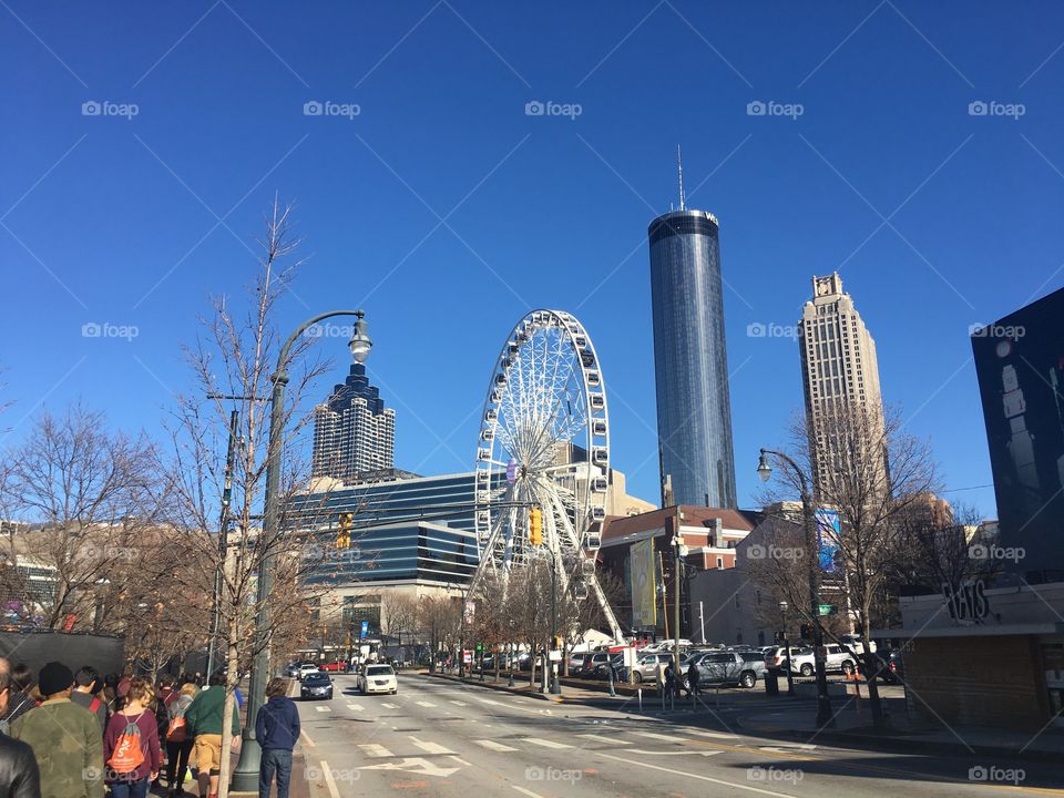 ferris wheel and city
