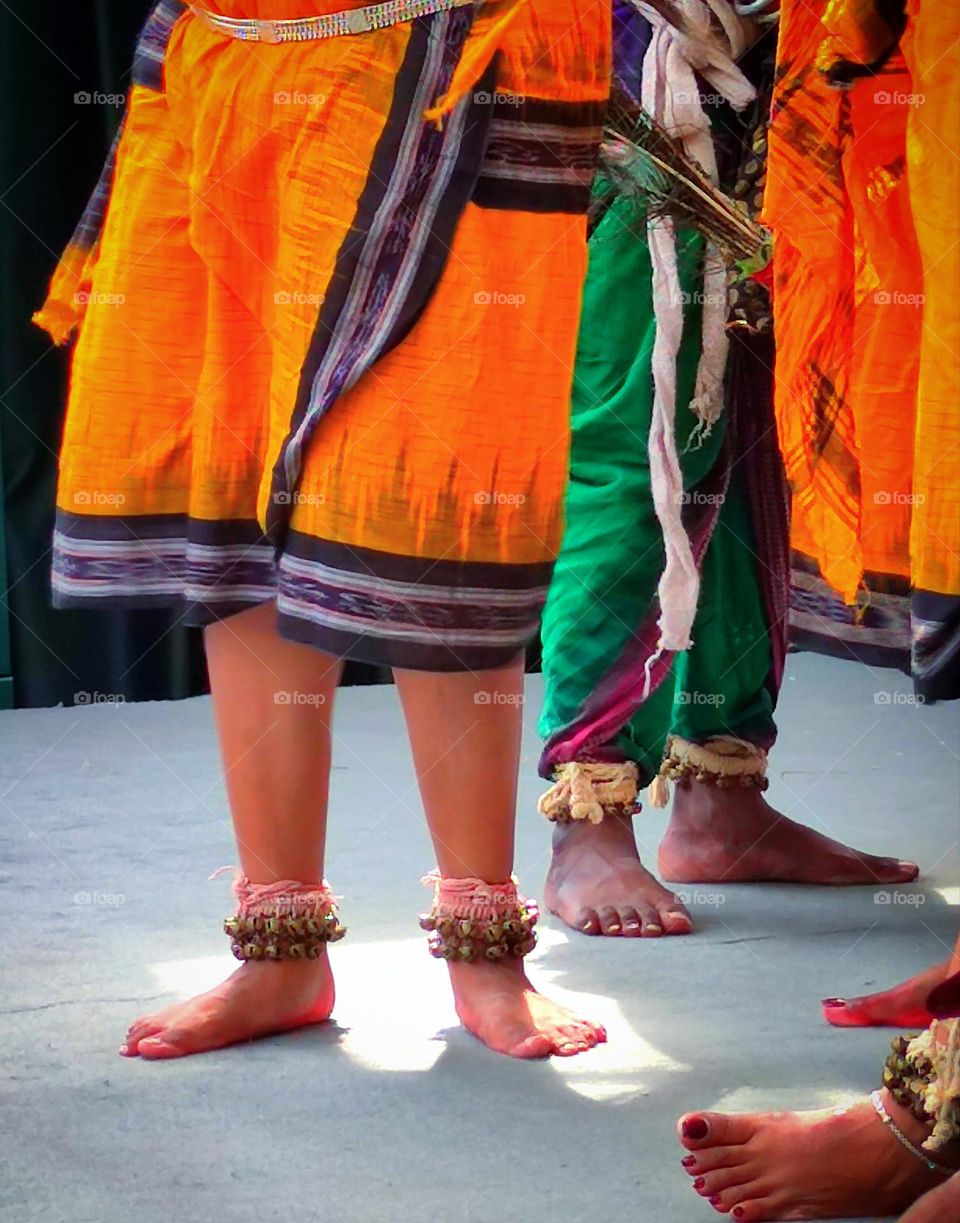 Summer. Indian dances. Bare feet of women and men. National costumes