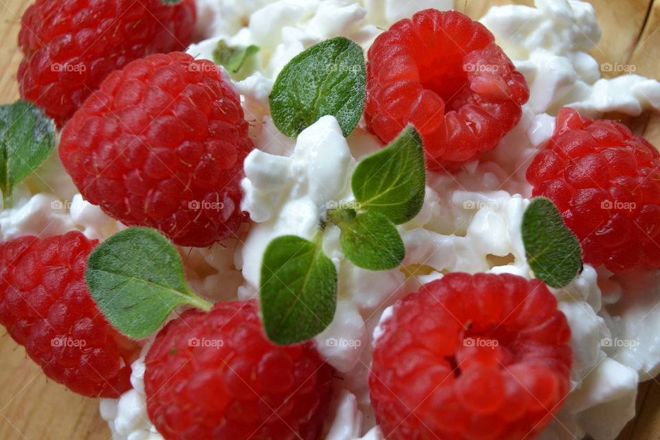 A great combination.. Fresh Raspberries, Spicy Oregano, and Cottage Cheese