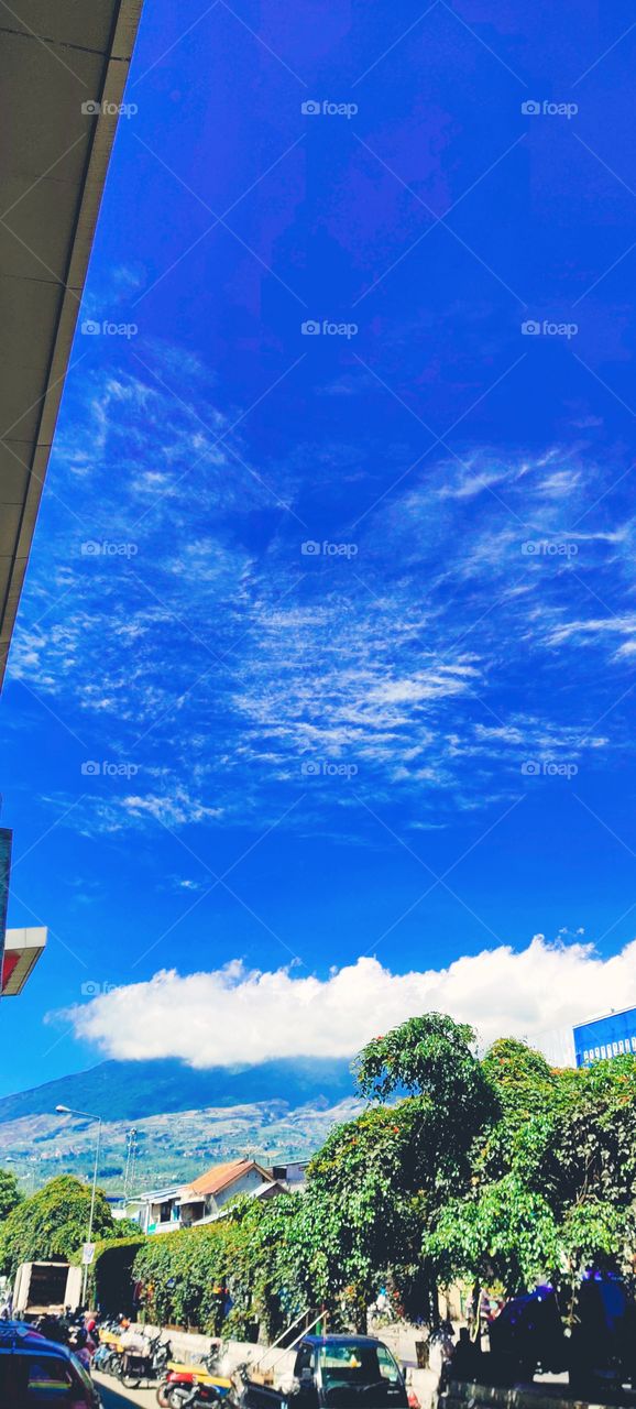 at the foot of the mountain