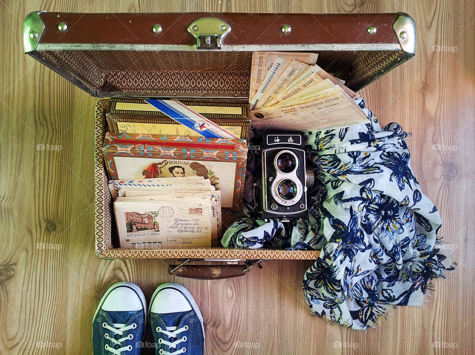 feet and the suitcase