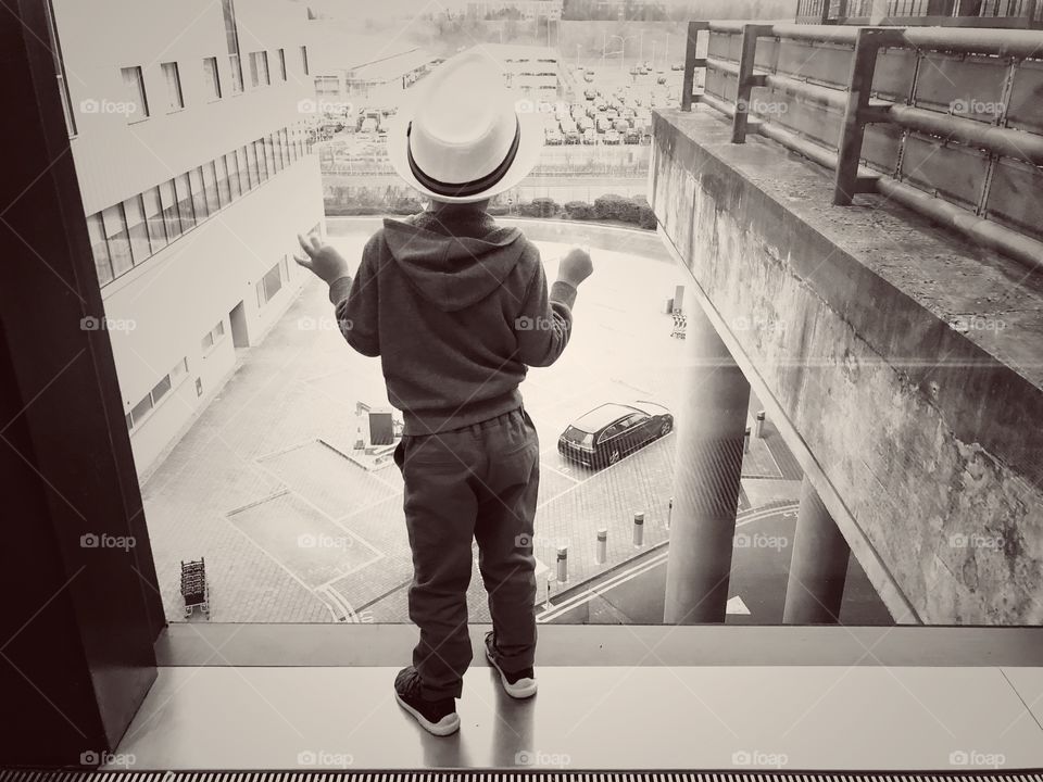 Little boy in the window 