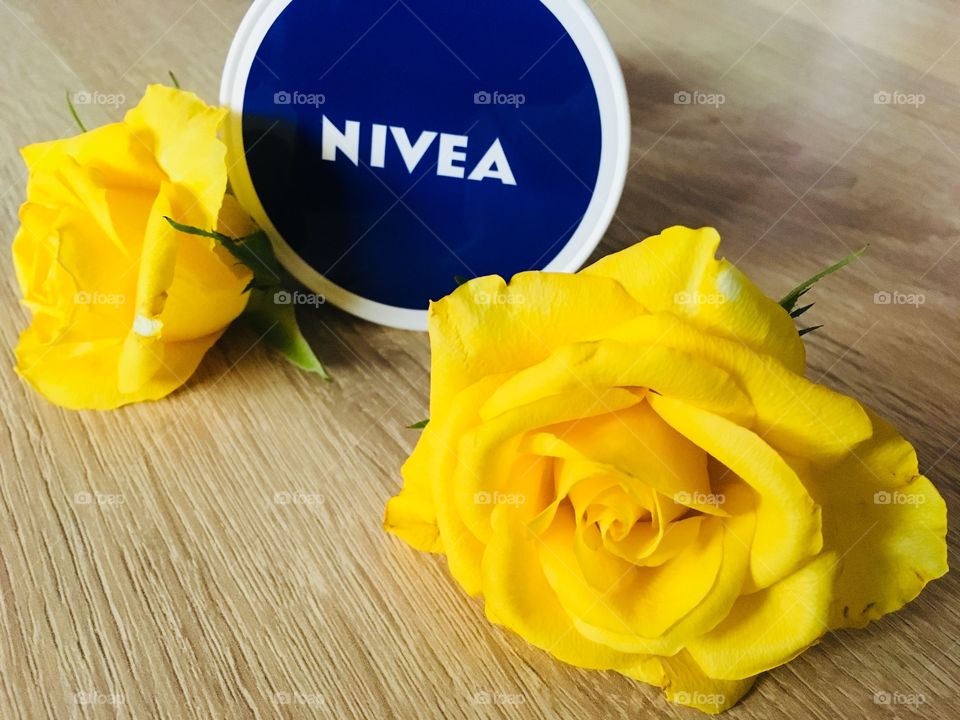Nivea and yellow rose