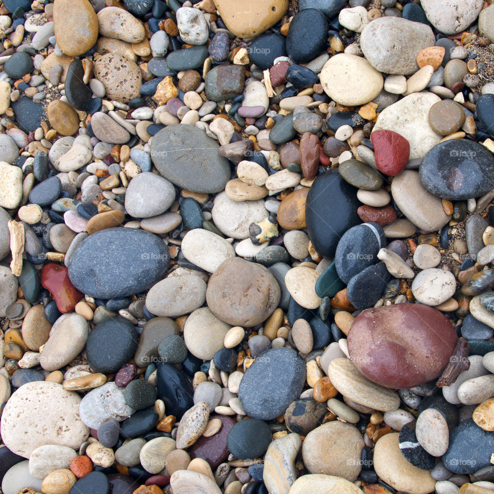 Colourful Pebbles on a beach 