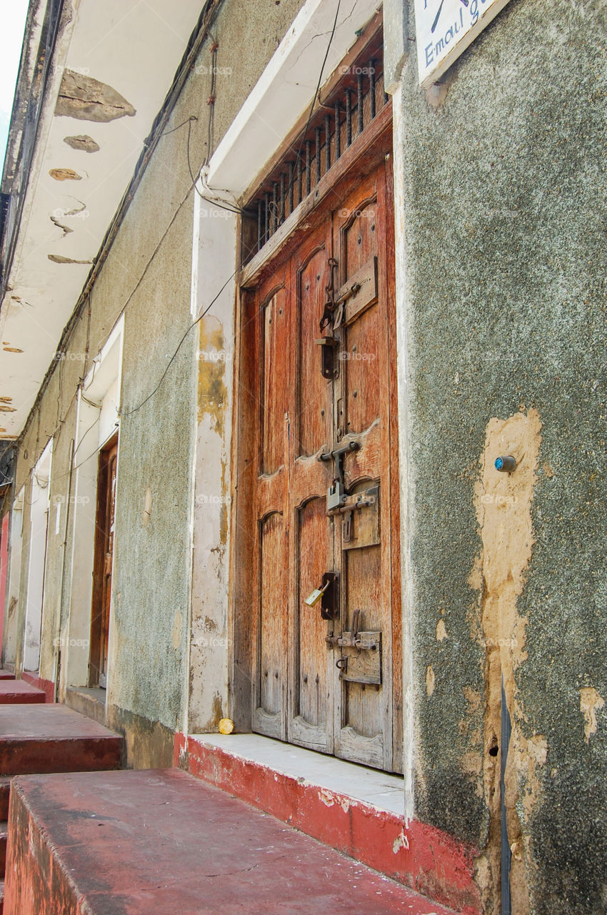 Old worn door in Stonetown on Zanzibar.