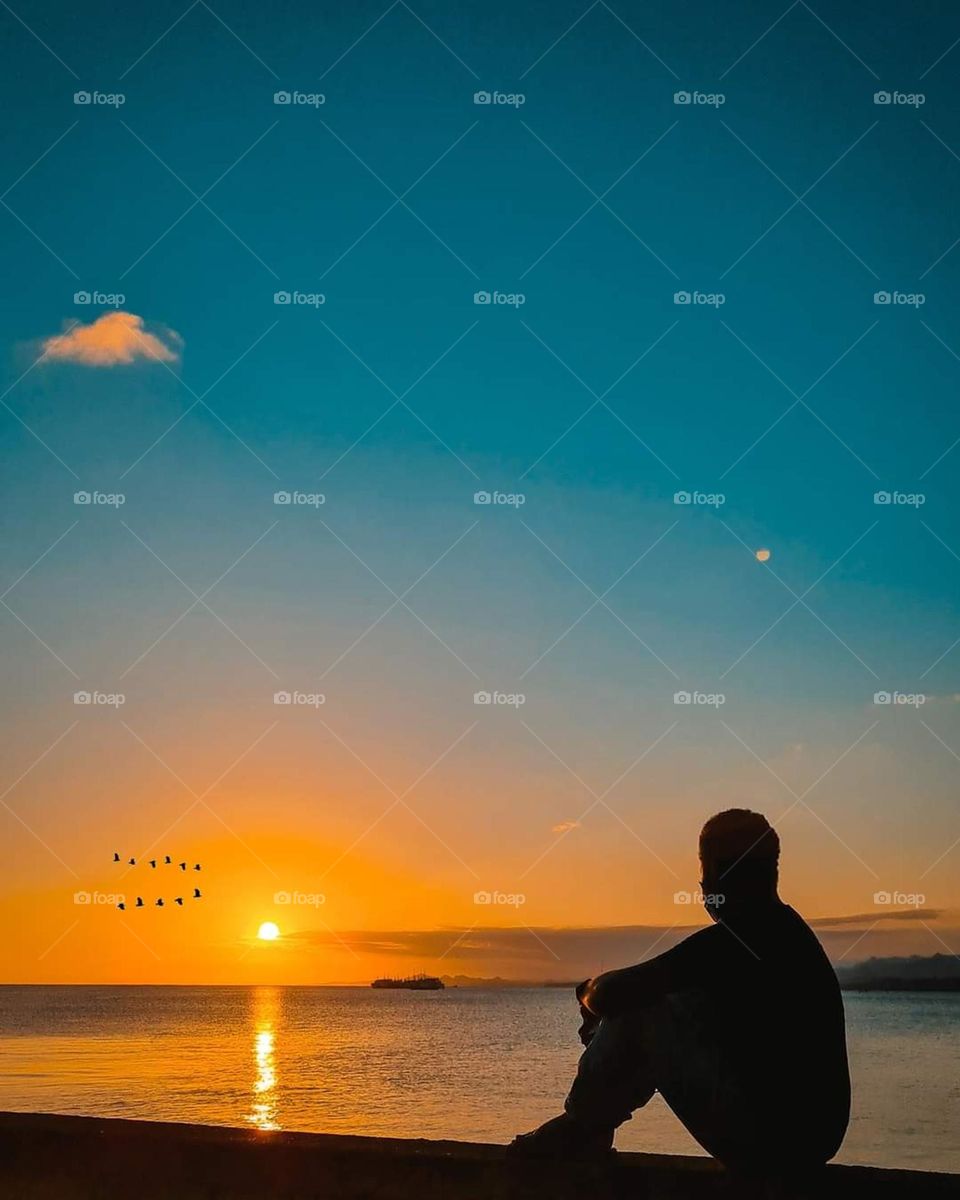 Enjoying a beautiful sunset at the Aroma coast in Papua New Guinea