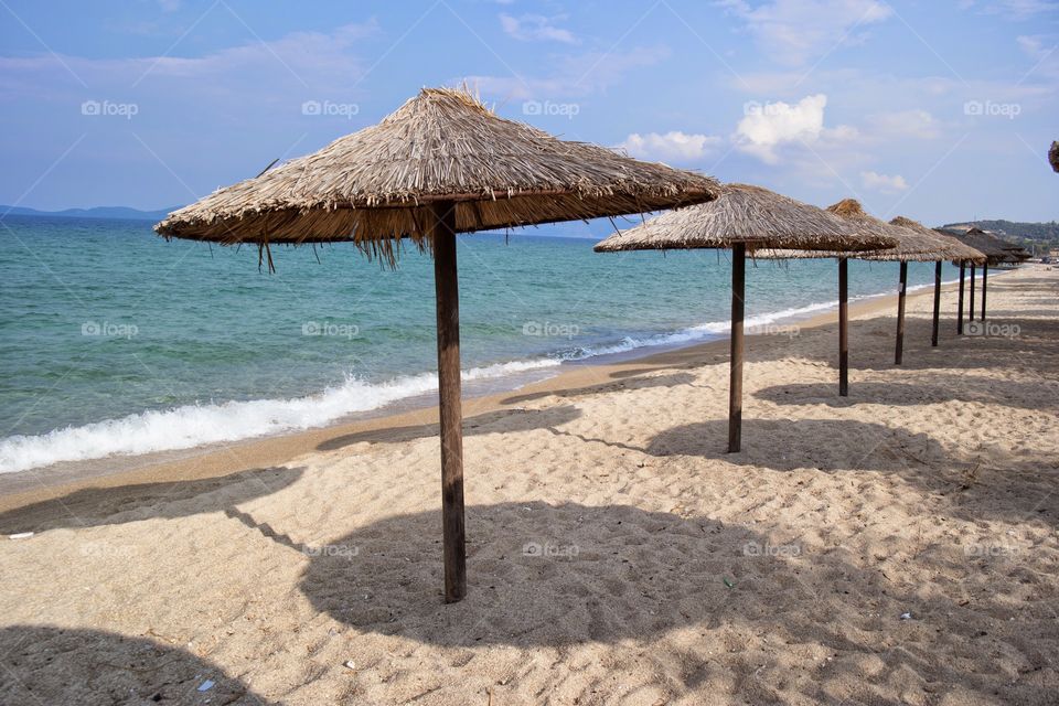 Parasols in a row at beach