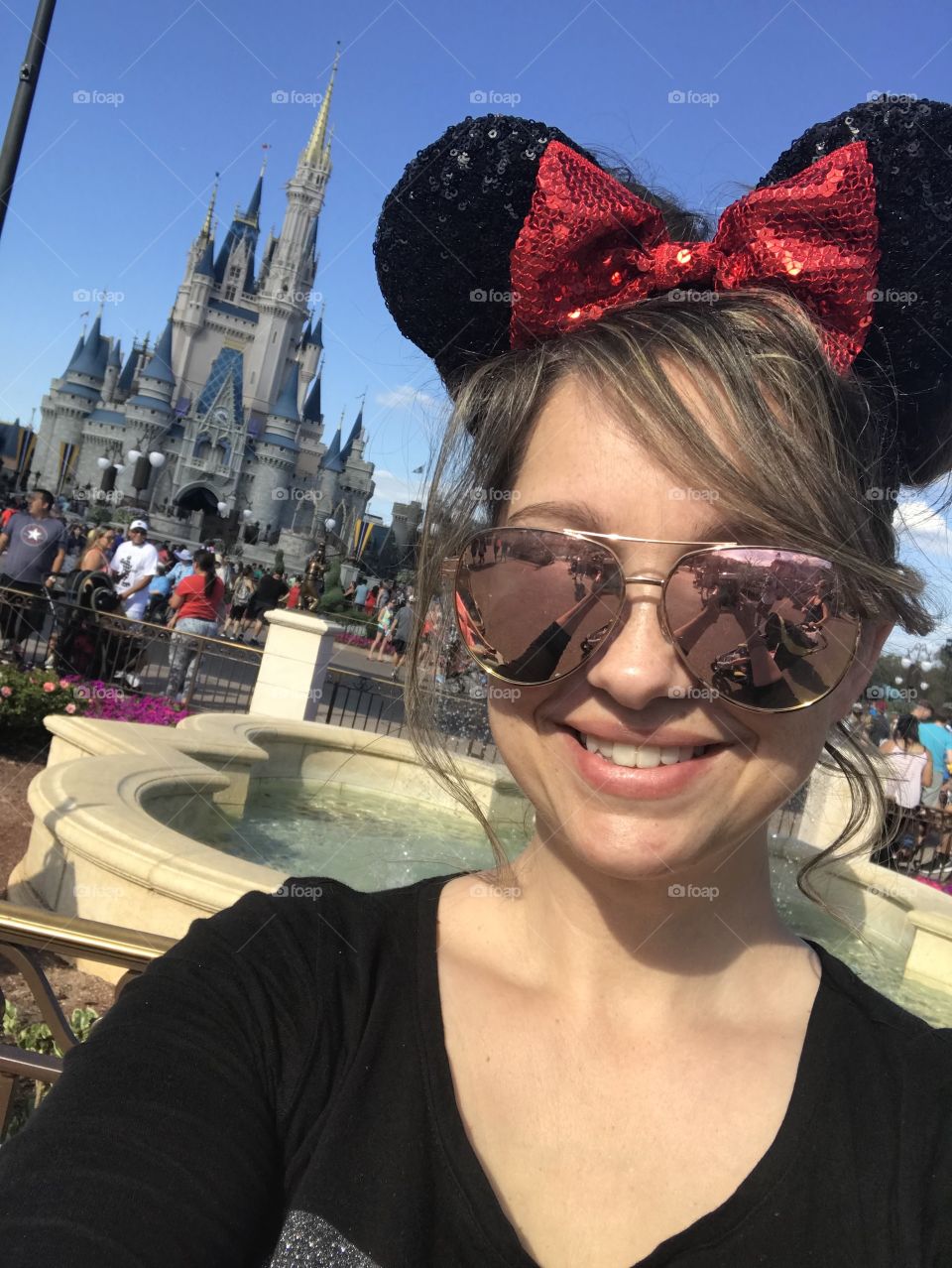 Female at Disney with sequined ears