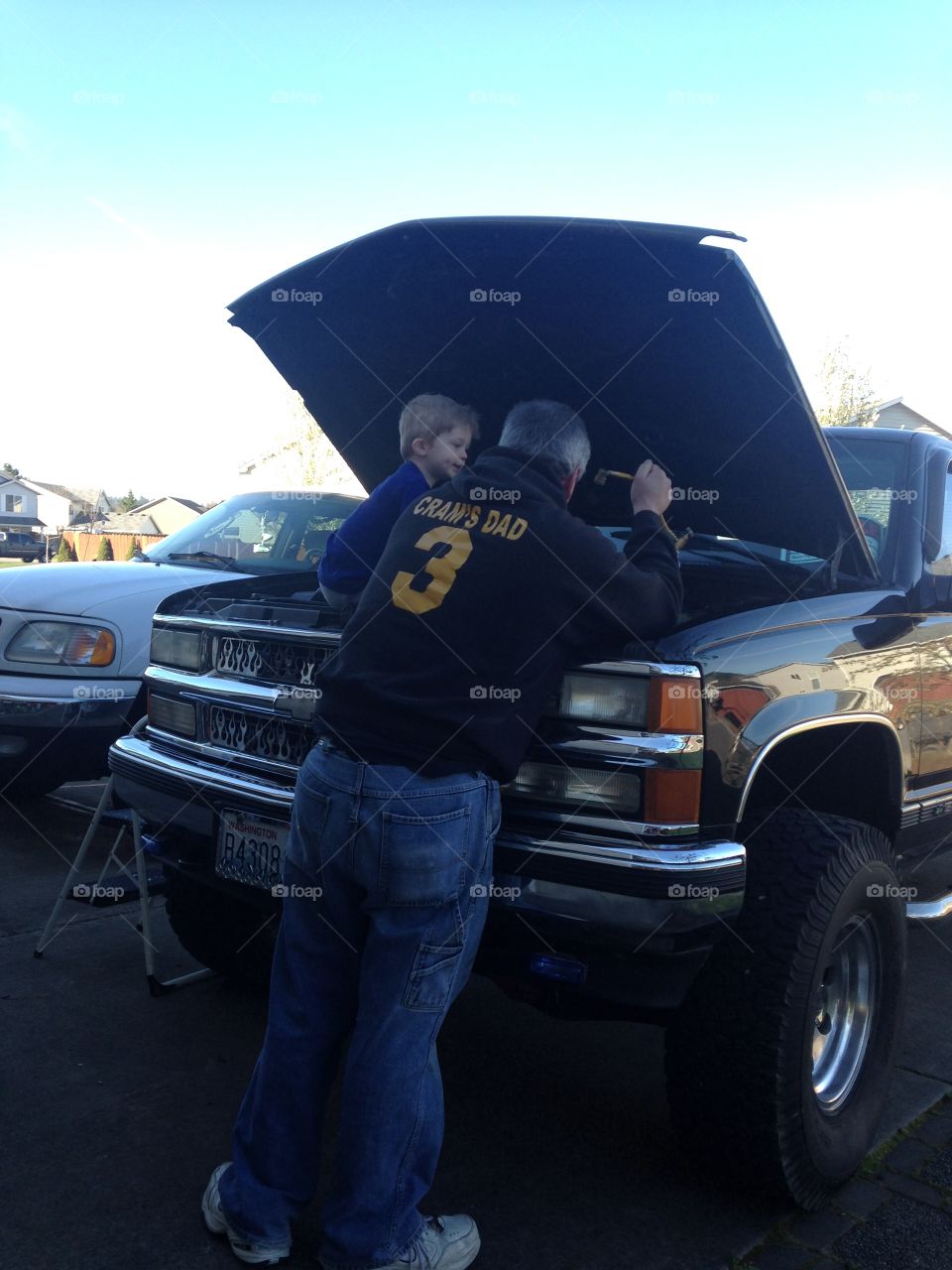 Working on the truck with daddy