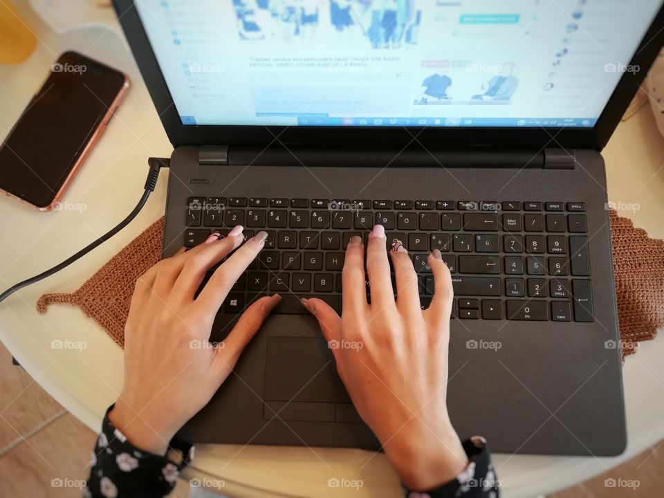 Woman hands on pc keyboard