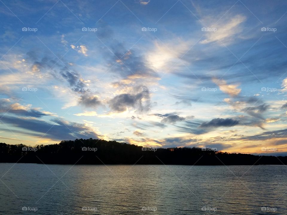 sunset over lake.