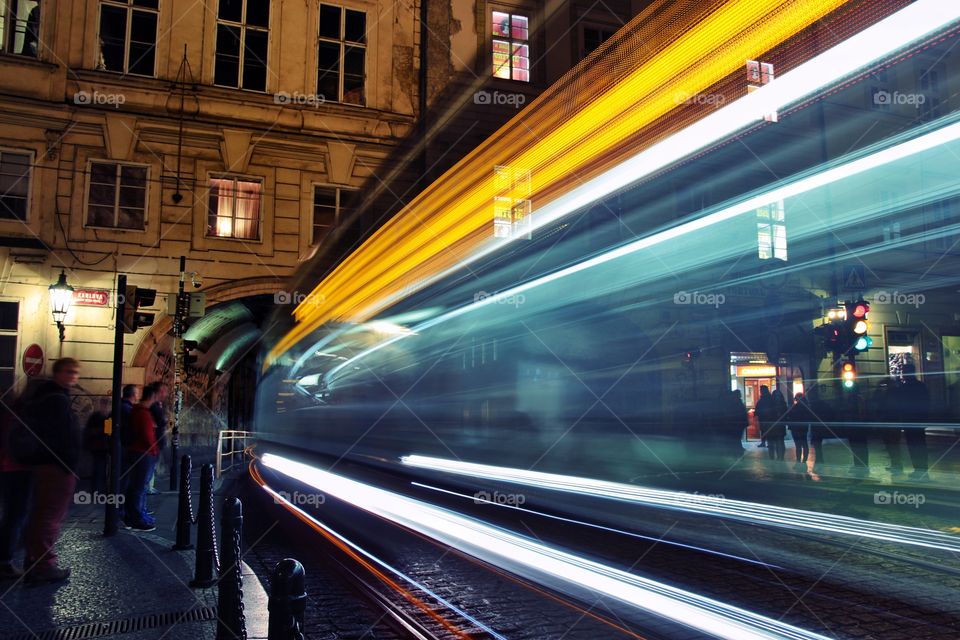 Tram pulls into the tunnel long exposure