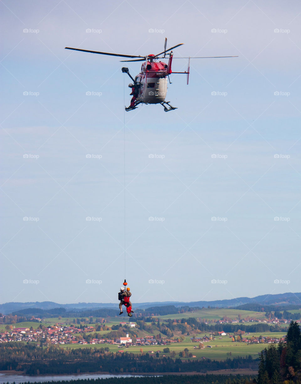 Rescuer being airlifted on winch