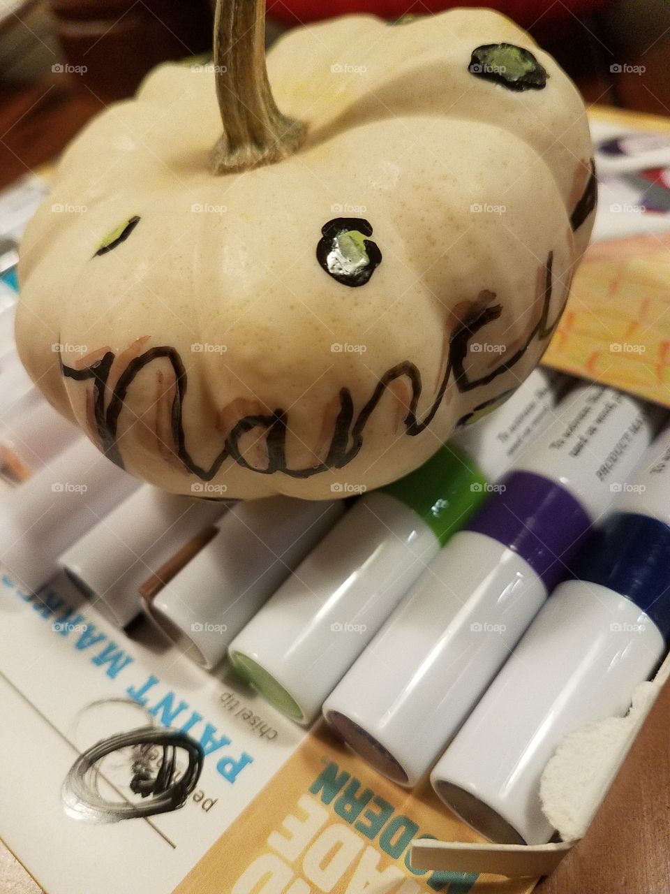 painted party pumpkin with paint pens