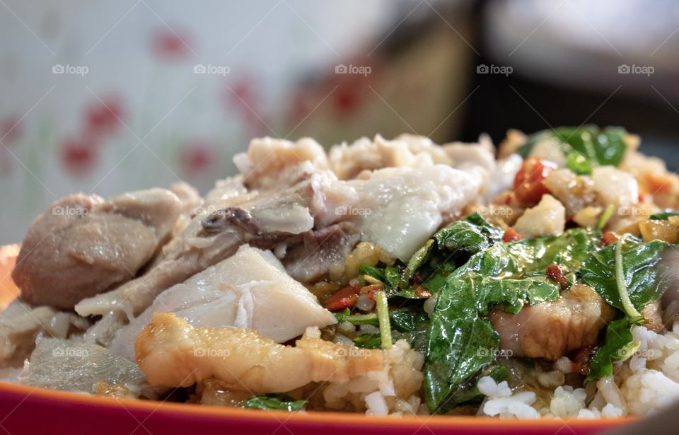 Bangkok/Thailand-Febuary 05 2019:Rice topped with stir-fried pork and basil ,famous Thai food menu