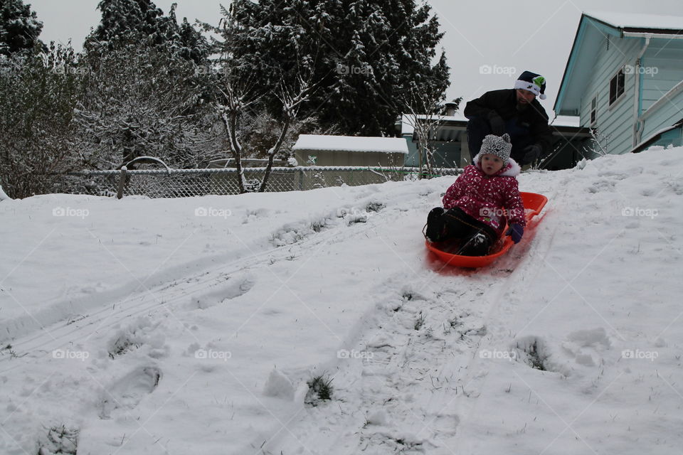 first snow sledding