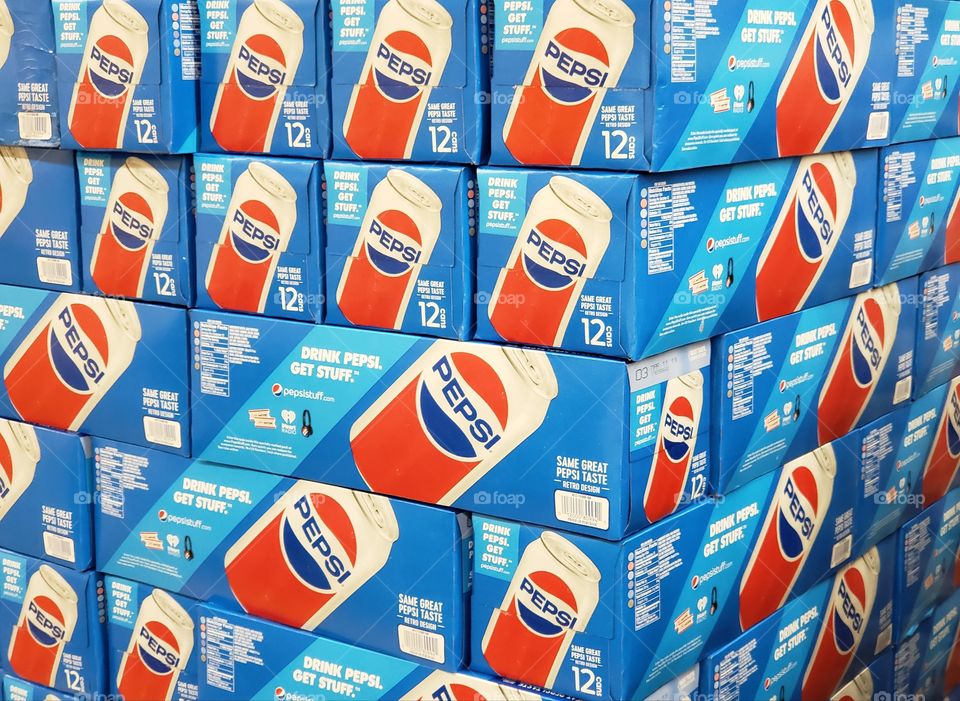 Cases of Pepsi in display