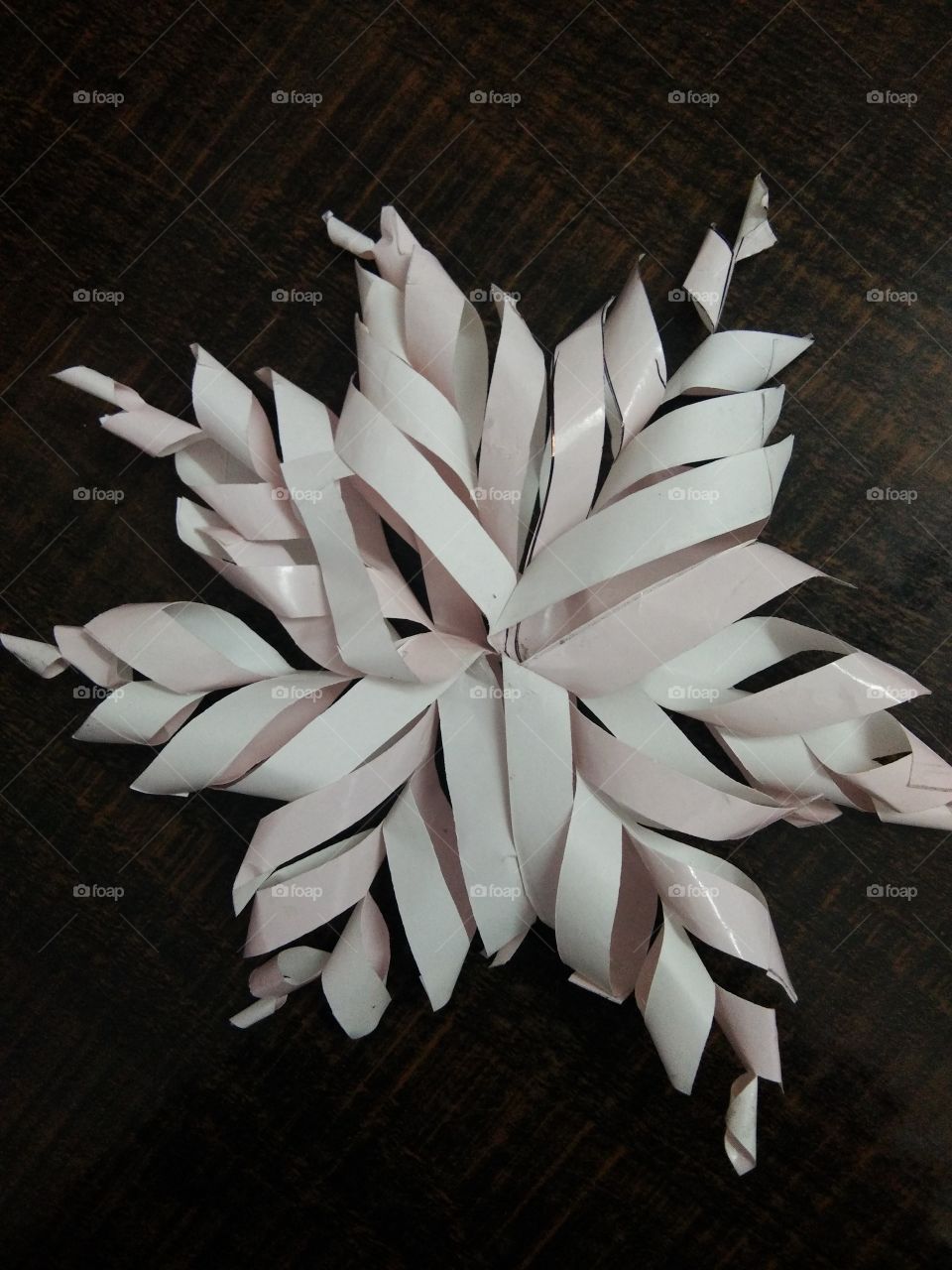 Waste in use. Handmade paper flower. Artistically made.