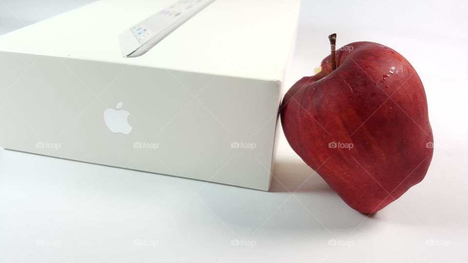 ipad mini 2 with red apple