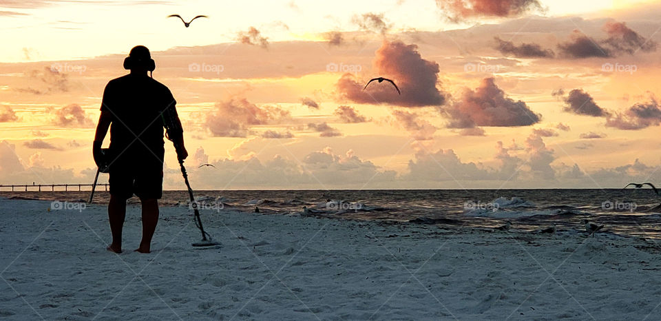 treasure hunter on the beach.