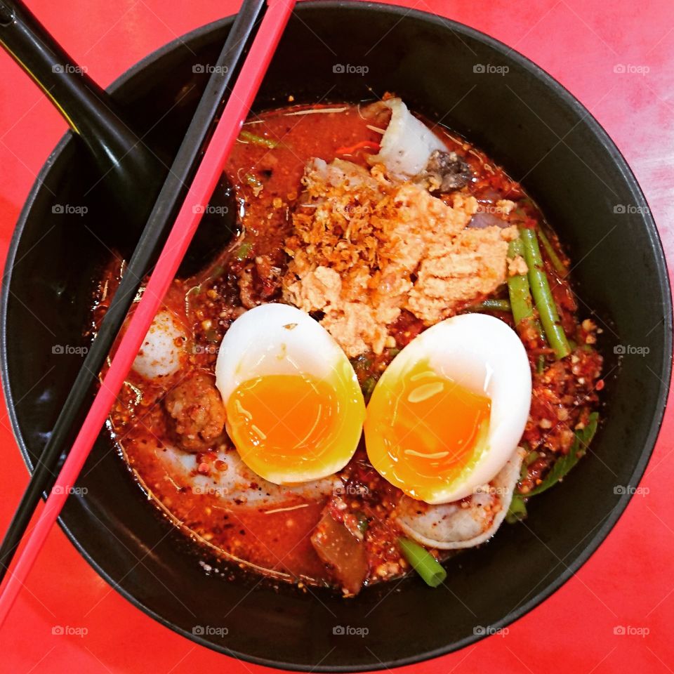 Spicy Pink Soup with Flat Noodles and Soft-boiled Egg
